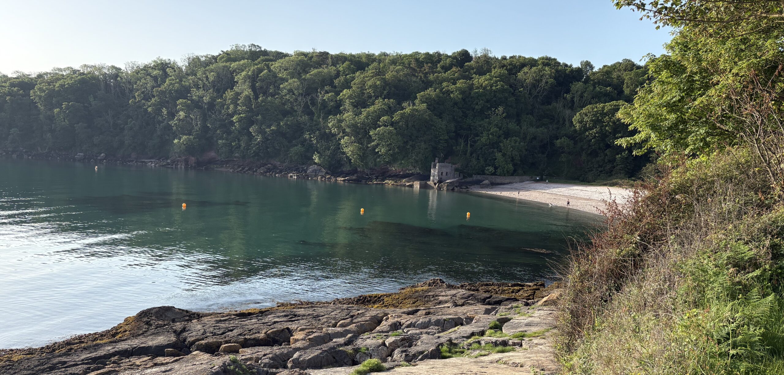 Sea dipping...life feels different - a picture of a secluded cove on a sunny day